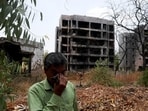 Suresh Patni, father of Akash Patni, 14, who died in an Air India Boeing 787-8 Dreamliner plane crash incident on June 12, 2025, during take-off from an airport, mourns near the plane crash site in Ahmedabad, India, June 10, 2026 (REUTERS)