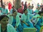 Upset over the remarks made by Haryana Women’s Commission chairperson Renu Bhatia during her visit to Lok Nayak Jai Prakash (LNJP) Hospital in Kurukshetra on Sunday, scores of nursing staff members on Tuesday observed a two-hour pen-down strike in Haryana. (HT Photo)