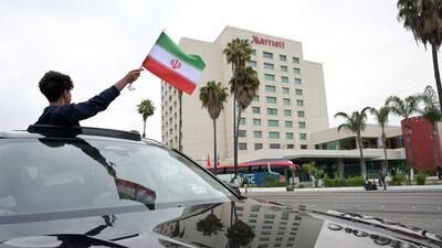 A person waves an Iranian flag from a vehicle outside the hotel where Iran's players are staying following their arrival in Tijuana, Mexico, on June 7, 2026, ahead of the FIFA 2026 World Cup football tournament. (AFP) A person waves an Iranian flag from a vehicle outside the hotel where Iran's players are staying following their arrival in Tijuana, Mexico, on June 7, 2026, ahead of the FIFA 2026 World Cup football tournament. (AFP)