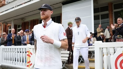 England's Ben Stokes and England's Joe Root walk out ahead of play (Action Images via Reuters)