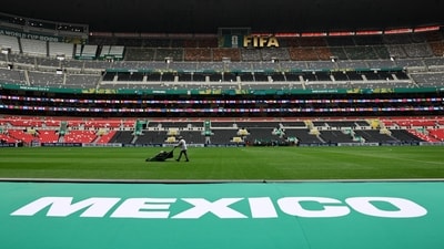General view as workers prepare the pitch ahead of the match (REUTERS)
