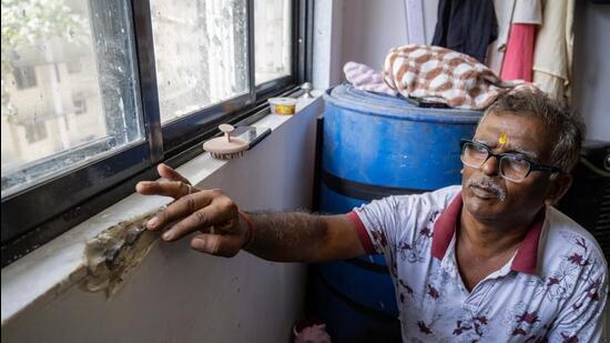 Abhimany Vishwakarma, who moved into a flat in the PAP complex recently, said the marble around his window had broken, and alleged substandard work (Satish Bate/ Hindustan Times)