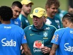 Brazil's head coach Carlo Ancelotti speaks to his players during a training session ahead of their match against Morocco. (AFP)