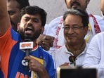 Abhijeet Dipke, center, founder of the Cockroach Janta Party, addresses his supporters after launching a nationwide protest campaign in Pune, India, Thursday.