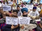 Members of Punjab Roadways, PUNBUS and PRTC Contract Workers Union, stage a protest demanding cancellation of the private kilometre scheme being implemented in the transport department, regularisation of contractual employees and immediate release of workers allegedly jailed during the course of the agitation, in Amritsar on Wednesday. (PTI) Members of Punjab Roadways, PUNBUS and PRTC Contract Workers Union, stage a protest demanding cancellation of the private kilometre scheme being implemented in the transport department, regularisation of contractual employees and immediate release of workers allegedly jailed during the course of the agitation, in Amritsar on Wednesday. (PTI)