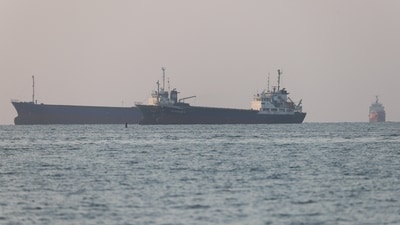 Vessels in the Strait of Hormuz near the beach of Bandar Abbas, Iran, June 8. (via REUTERS)
