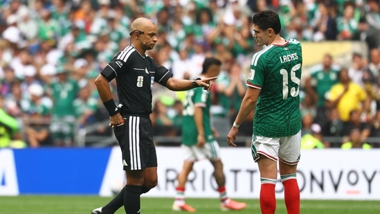 The match descended into chaos as South Africa's Zwane was also sent off before Mexico defender Cesar Montes received a red card of his own.(REUTERS)