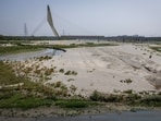 A partially dried-up river bed of Yamuna is pictured on a hot summer day in New Delhi.