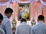 People bow in front of an image of Thailand's princess Bajrakitiyabha Mahidol at Chulalongkorn Hospital in Bangkok.