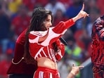 Singers Nora Fatehi, Vegedream and Sanjoy perform during the opening ceremony.