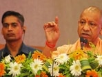 Uttar Pradesh chief minister Yogi Adityanath addressing an event in Varanasi on June 12. (HT photo)