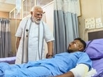 Prime Minister Narendra Modi meets Vishwash Kumar Ramesh, the lone survivor of yesterday's Air India plane crash, at a hospital, in Ahmedabad.