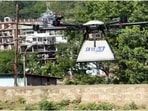 Drone being sued to send post in Mandi on Saturday. (Birbal Sharma/HT)