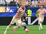 US defender #13 Tim Ream and Paraguay's forward #09 Antonio Sanabria fight for the ball during the 2026 World Cup Group D football match between USA and Paraguay at the Los Angeles Stadium in Inglewood on June 12, 2026.