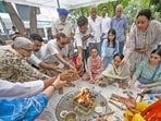 Families of victims pay their respects. (Sanchit Khanna/HT Photo)