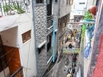 A view of the residential building in Gali No. 1, Tughlakabad Extension, where three people were killed after a massive fire broke out early Friday, in New Delhi,