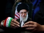 A woman holds an image of late Iranian Supreme Leader Ayatollah Ali Khamenei during a rally in Tehran, Iran. (Photo for representation)