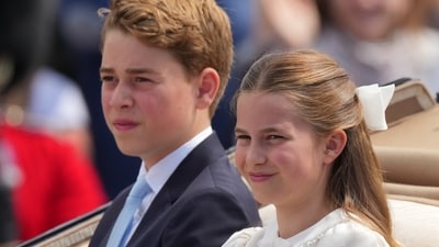 Britain's Prince George and Princess Charlotte ride on an open top carriage during Trooping The Colour, the King's annual birthday parade, in London, Saturday, June 13, 2026. AP/PTI(AP06_13_2026_000266B) (AP)