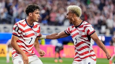 United States' Giovanni Reyna, left, celebrates with teammate Antonee Robinson after scoring his team's fourth goal during the World Cup. This was the first time that the USA scored four goals in a World Cup fixture. (AP Photo/Mark J. Terrill) United States' Giovanni Reyna, left, celebrates with teammate Antonee Robinson after scoring his team's fourth goal during the World Cup. This was the first time that the USA scored four goals in a World Cup fixture. (AP Photo/Mark J. Terrill)