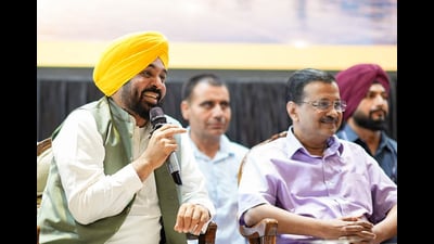 Punjab chief minister Bhagwant Mann with Aam Aadmi Party national convener Arvind Kejriwal during the state-level meeting of the Punjab State Traders Commission in Jalandhar on Saturday. (@BhagwantMann X) Punjab chief minister Bhagwant Mann with Aam Aadmi Party national convener Arvind Kejriwal during the state-level meeting of the Punjab State Traders Commission in Jalandhar on Saturday. (@BhagwantMann X)