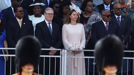 Britain's Prime Minister Keir Starmer and his wife, Victoria Starmer, watch the Trooping the Colour parade which honours Britain's King Charles, as part of the official birthday celebrations, in London, Britain, June 13, 2026. REUTERS/Toby Melville(REUTERS)