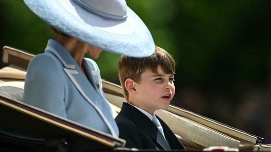 Britain's Catherine, Princess of Wales and Britain's Prince Louis of Wales make their way back to Buckingham Palace from Horse Guards Parade during the King's Birthday Parade "Trooping the Colour" in London on June 13, 2026. (Photo by JUSTIN TALLIS / AFP)(AFP)