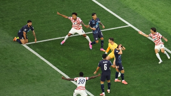 Weston McKennie, Folarin Balogun and Christian Pulisic of the U.S. celebrate after Paraguay's Damian Bobadilla scored the United States first with an own goal&nbsp;(REUTERS)