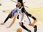 SAN ANTONIO, TEXAS - JUNE 13: Stephon Castle #5 of the San Antonio Spurs dribbles past Josh Hart #3 of the New York Knicks during the third quarter in Game Five of the 2026 NBA Finals at Frost Bank Center on June 13, 2026 in San Antonio, Texas. (Photo by Ronald Cortes / GETTY IMAGES NORTH AMERICA / Getty Images via AFP)