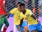 Brazil's forward #07 Vinicius Junior celebrates scoring his team's first goal during the 2026 World Cup Group C football match between Brazil and Morocco