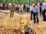 Rescue work underway at a 40-ft-deep unauthorised mine, in Ramgarh district. At least four persons died of suspected asphyxiation while allegedly carrying out mining here. (PTI) Rescue work underway at a 40-ft-deep unauthorised mine, in Ramgarh district. At least four persons died of suspected asphyxiation while allegedly carrying out mining here. (PTI)