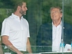 Donald Trump attends a LIV Golf tournament with his son Erik Trump (L). Donald Trump attends a LIV Golf tournament with his son Erik Trump (L).