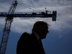 President Trump speaks next to the ballroom construction site at the White House in Washington, D.C., last month.