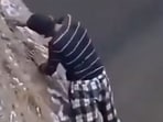The 10-second video shows Antar climbing a rocky cliff without any safety equipment.