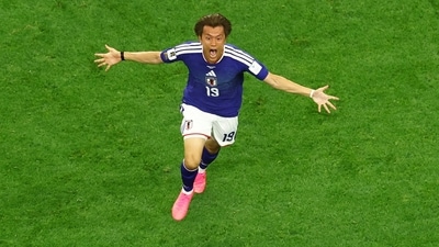 Japan's Koki Ogawa celebrates their second goal, scored by Daichi Kamada. (REUTERS)