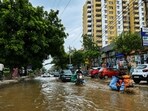 A flooded stretch of the road leading from Tulip Chowk to Darbaripur in Gurugram seen on Saturday. (HT)