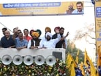 AAP national convener Arvind Kejriwal, chief minister Bhagwant Mann, Punjab in-charge Manish Sisodia, along with AAP state president Aman Arora and other leaders, during a roadshow in Mohali on Sunday. (Sanjeev Sharma/HT) AAP national convener Arvind Kejriwal, chief minister Bhagwant Mann, Punjab in-charge Manish Sisodia, along with AAP state president Aman Arora and other leaders, during a roadshow in Mohali on Sunday. (Sanjeev Sharma/HT)