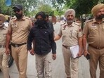 One of the two accused arrested for transmitting footage of army movements for foreign handlers in Bathinda on Monday. (Sanjeev Kumar/HT)