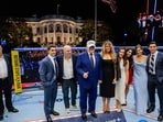 US President Donald Trump, US First Lady Melania Trump, UFC CEO Dana White and other guests stand inside the Octagon at UFC Freedom 250 on the South Lawn of the White House in Washington, DC, on June 15, 2026. (Photo by Evan Vucci / POOL / AFP)