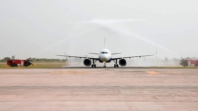 Gram it: IndiGo flight 6E-2278 receives a water canal salute as commercial flight operations were kicked off at Noida International Airport, in Jewar, on Monday. (Photo: HT video grab)