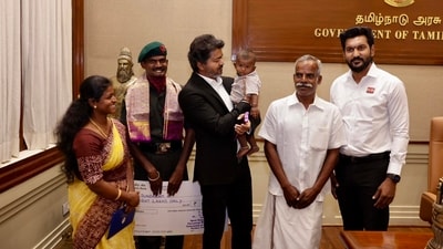 Tamil Nadu chief minister Vijay with Lance Naik Meenatchi Sundaram A and his family. Tamil Nadu chief minister Vijay with Lance Naik Meenatchi Sundaram A and his family.