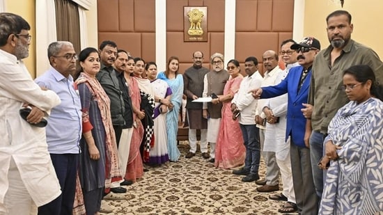 Lok Sabha Speaker Om Birla (in the middle) receives a letter from rebel TMC MPs for separate seating arrangement in the House, in New Delhi on Sunday. (Handout)