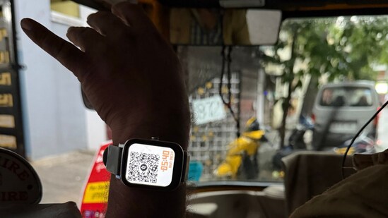 Bengaluru auto driver shows QR code on smartwatch to collect fare. (X/@nothemantsharma)