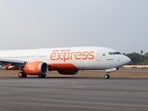 The aircraft, carrying more than 180 passengers, landed safely. 