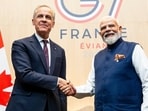 Canadian Prime Minister Mark Carney (left) meets with Prime Minister of India Narendra Modi, during the G7 summit in Evian-les-Bains, France, on Tuesday. (AP)