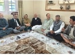 Former district development council chairperson Safina Baig during a meeting with National Conference leaders, in Baramulla. MLA Javeed Baig (extreme left) is also present. (HT Correspondent)