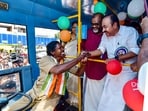 Kerala chief minister VD Satheesan (in white) with KSTRC's first PSC-recruited woman driver in Thiruvananthapuram on June 15.
