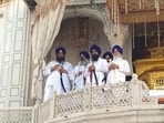 The five Sikh high priests pronouncing the religious verdict against Punjab chief minister Bhagwant Mann from the Akal Takht in the Golden Temple complex in Amritsar on Monday. (Sameer Sehgal/HT)