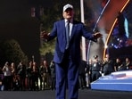 FILE PHOTO: U.S. President Donald Trump gestures as he departs after attending UFC Freedom 250 on the South Lawn of the White House in Washington, D.C., U.S., June 15, 2026. REUTERS/Jonathan Ernst/File Photo