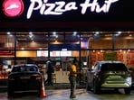 Yum Brands sells Pizza Hut for $2.7B in two deals. Stock rises as company boosts buyback.  (REUTERS/Luc Gnago/File Photo)