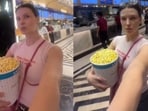 An Ukrainian woman said Indian cinemas felt very different from Europe, from security checks to food options.